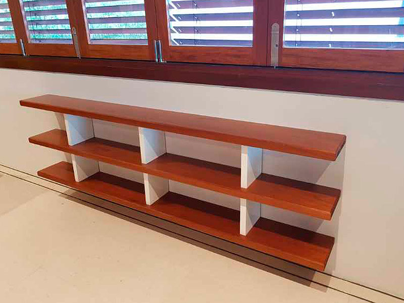 stained timber bookshelves